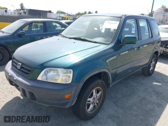 1999 Honda CR-V EX with VIN JHLRD1866XC028200, listed as a IAAI auction lot 42040657 with 207,397 mi miles. Bid and sale history available at carsss.com. Image 2.