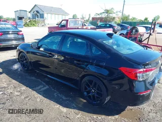 2023 Honda Civic Sport with VIN 2HGFE2F56PH509382, listed as a IAAI auction lot 42296205 with 125,584 mi miles and . Bid and sale history available at DreamBid. Image 3.