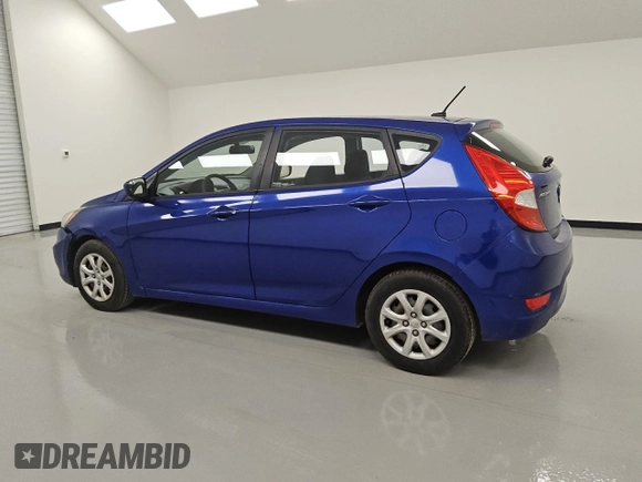 2014 Hyundai Accent GS z VIN KMHCT5AE0EU141822, wystawiony jako Copart lot #54233245 z przebiegiem 137 510 mil mil oraz Czysty tytuł • Clean title. Historia ofert i sprzedaży dostępna na DreamBid. Obrazek 2.