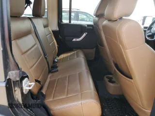 2011 Jeep Wrangler Unlimited Rubicon with VIN 1J4BA6H16BL561658, listed as a Copart auction lot 58379755 with 103,587 mi miles and Salvage title. Bid and sale history available at DreamBid. Image 10.