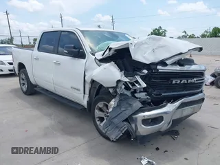 2019 Ram 1500 Big Horn z VIN 1C6RREFT3KN581499, wystawiony jako IAAI lot #42220505 z przebiegiem 208 095 mil mil oraz . Historia ofert i sprzedaży dostępna na DreamBid. Obrazek 1.