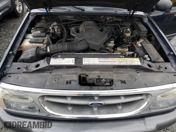 1999 Ford Explorer XLT z VIN 1FMZU32E6XZB83945, wystawiony jako Copart lot #85654724 z przebiegiem 308 924 mil mil oraz Szkoda całkowita • Salvage title. Historia ofert i sprzedaży dostępna na DreamBid. Obrazek 12.