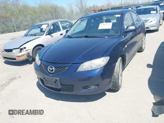 2009 Mazda Mazda3 i Touring Value with VIN JM1BK32F191193501, listed as a IAAI auction lot 42042711 with 165,234 mi miles. Bid and sale history available at carsss.com. Image 6.