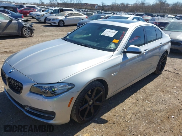 2014 BMW 5 Series 528i xDrive with VIN WBA5A7C5XED612822, listed as a IAAI auction lot 41701488 with 120,939 mi miles and . Bid and sale history available at DreamBid. Image 2.