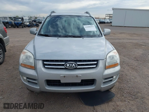 2005 Kia Sportage LX with VIN KNDJE723557070596, listed as a IAAI auction lot 42008414 with 215,204 mi miles and . Bid and sale history available at carsss.com. Image 6.