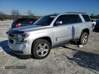 2015 Chevrolet Tahoe LT with VIN 1GNSCBKC5FR292582, listed as a Copart auction lot 42202885 with 152,388 mi miles and Salvage Title. Bid and sale history available at DreamBid. Image 1.