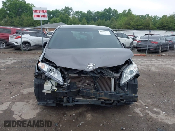 2014 Toyota Sienna L with VIN 5TDZK3DC5ES439593, listed as a IAAI auction lot 42420219 with 136,544 mi miles and . Bid and sale history available at DreamBid. Image 13.