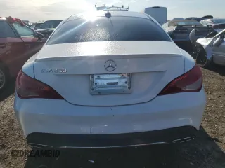 2018 Mercedes-Benz CLA 250 with VIN WDDSJ4EBXJN658054, listed as a Copart auction lot 54446815 with 94,834 mi miles and Salvage title. Bid and sale history available at DreamBid. Image 6.