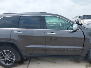 2021 Jeep Grand Cherokee 80th Anniversary with VIN 1C4RJFBG0MC504148, listed as a IAAI auction lot 42063979 with 77,941 mi miles and . Bid and sale history available at DreamBid. Image 14.