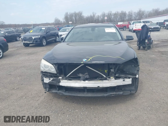 2015 BMW 7 Series 740Li xDrive with VIN WBAYF4C55FD874116, listed as a IAAI auction lot 41877144 with 156,280 mi miles. Bid and sale history available at carsss.com. Image 13.