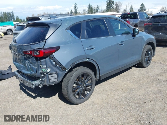 2023 Mazda CX-5 2.5 S Carbon Edition with VIN JM3KFBCM8P0134757, listed as a IAAI auction lot 41893648 with 9,587 mi miles. Bid and sale history available at carsss.com. Image 4.