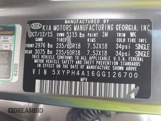 2016 Kia Sorento EX with VIN 5XYPH4A16GG126700, listed as a IAAI auction lot 41557828 with 130,102 mi miles. Bid and sale history available at carsss.com. Image 9.