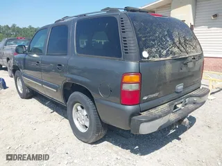 2001 Chevrolet Tahoe LS with VIN 1GNEK13T91J141616, listed as a IAAI auction lot 41951355 with 156,077 mi miles. Bid and sale history available at carsss.com. Image 3.