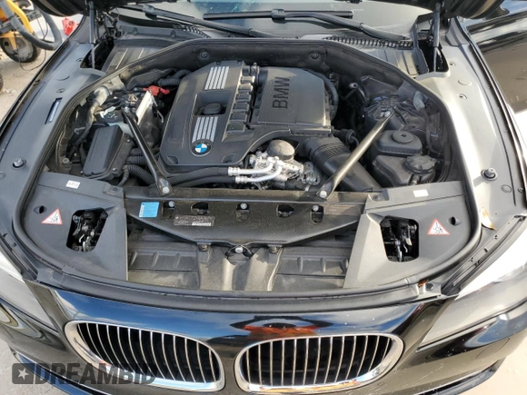 2011 BMW 7 Series 740i with VIN WBAKA4C59BC392351, listed as a Copart auction lot 84942304 with 76,874 mi miles and Salvage Title. Bid and sale history available at carsss.com. Image 11.
