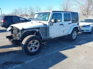 2013 Jeep Wrangler Unlimited Sahara with VIN 1C4BJWEG3DL658530, listed as a IAAI auction lot 41421006 with 115,321 mi miles and . Bid and sale history available at DreamBid. Image 2.