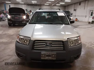 2006 Subaru Forester 2.5 X with VIN JF1SG636X6H712880, listed as a IAAI auction lot 40062211 with 127,537 mi miles. Bid and sale history available at carsss.com. Image 12.