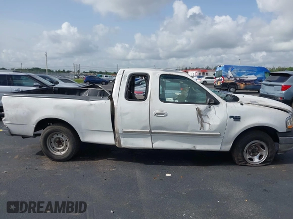 1999 Ford F-150 with VIN 1FTRX17W6XNB65695, listed as a IAAI auction lot 42444132 with Not provided miles and . Bid and sale history available at DreamBid. Image 14.