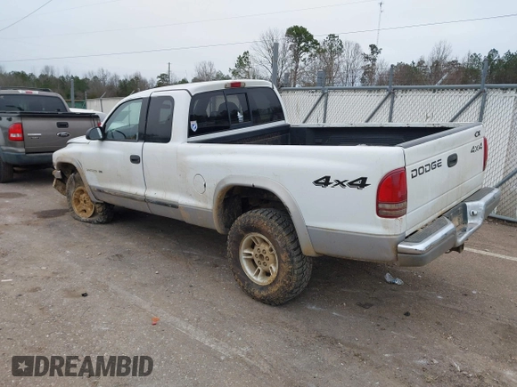 1999 Dodge Dakota SLT with VIN 1B7GG22X3XS223969, listed as a IAAI auction lot 41329085 with 185,859 mi miles and . Bid and sale history available at carsss.com. Image 3.