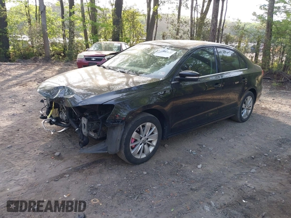 2015 Volkswagen Jetta SE z VIN 3VWD07AJ1FM277499, wystawiony jako IAAI lot #42085122 z przebiegiem 122 754 mil mil oraz . Historia ofert i sprzedaży dostępna na DreamBid. Obrazek 17.