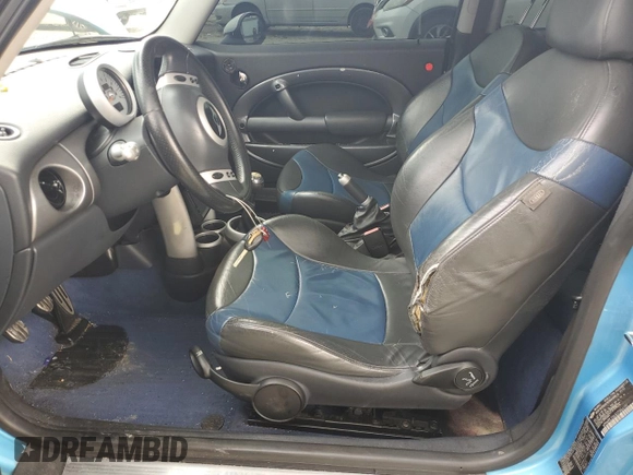 2003 MINI Hardtop S with VIN WMWRE33483TD64131, listed as a Copart auction lot 57428065 with 138,384 mi miles and Clean Title. Bid and sale history available at DreamBid. Image 7.