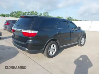 2012 Dodge Durango SXT with VIN 1C4RDJAG7CC293167, listed as a IAAI auction lot 42446634 with 140,182 mi miles and . Bid and sale history available at DreamBid. Image 4.