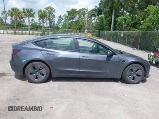 2023 Tesla Model 3 z VIN 5YJ3E1EA4PF461624, wystawiony jako IAAI lot #42433789 z przebiegiem 22 182 mil mil oraz . Historia ofert i sprzedaży dostępna na DreamBid. Obrazek 13.