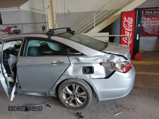 2012 Hyundai Sonata Limited z VIN 5NPEC4AC6CH361933, wystawiony jako IAAI lot #42004586 z przebiegiem 88 500 mil mil oraz . Historia ofert i sprzedaży dostępna na DreamBid. Obrazek 6.