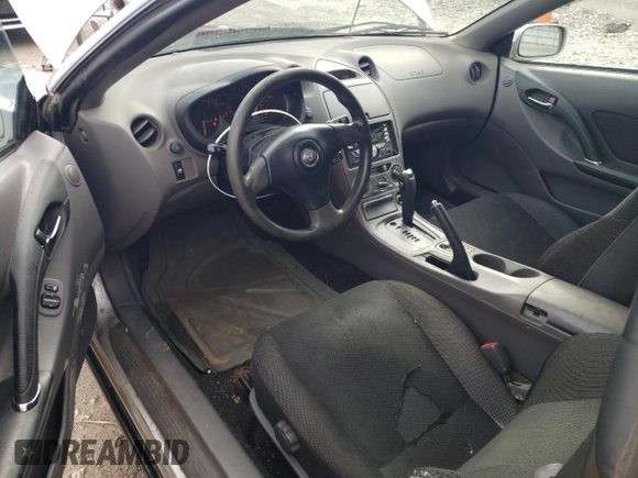 2001 Toyota Celica GT z VIN JTDDR32T910100289, wystawiony jako Copart lot #49600415 z przebiegiem 227 862 mil mil oraz Czysty tytuł • Clean title. Historia ofert i sprzedaży dostępna na DreamBid. Obrazek 8.