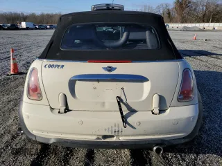 2008 MINI Convertible with VIN WMWRF33588TG18353, listed as a Copart auction lot 49401615 with 124,540 mi miles and Salvage Title. Bid and sale history available at DreamBid. Image 6.