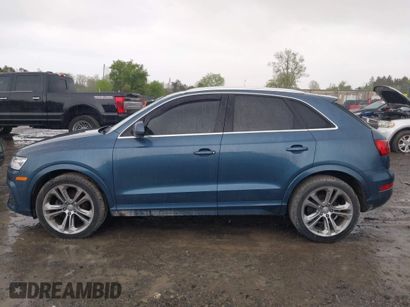 2016 Audi Q3 Premium Plus with VIN WA1EFCFSXGR015667, listed as a IAAI auction lot 42201938 with 133,359 mi miles and . Bid and sale history available at DreamBid. Image 14.