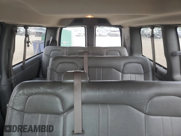2018 Chevrolet Express Passenger LS with VIN 1GAWGEFG0J1212151, listed as a Copart auction lot 57289585 with 138,956 mi miles and Salvage title. Bid and sale history available at DreamBid. Image 10.