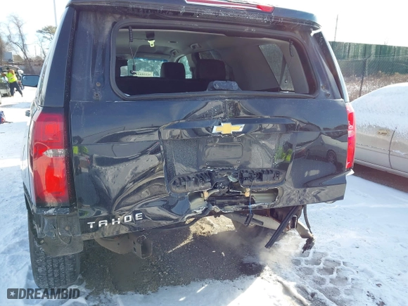 2019 Chevrolet Tahoe LT with VIN 1GNSKBKC7KR138999, listed as a IAAI auction lot 41339420 with 74,297 mi miles. Bid and sale history available at carsss.com. Image 6.