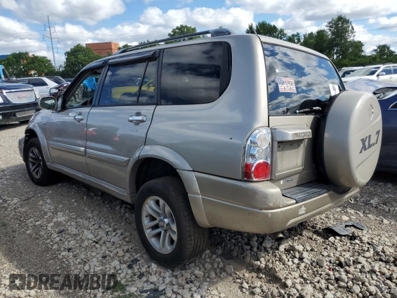2005 Suzuki XL7 LX z VIN JS3TX92V854105506, wystawiony jako Copart lot #60683524 z przebiegiem 197 035 mil mil oraz Szkody całkowita. Historia ofert i sprzedaży dostępna na DreamBid. Obrazek 2.