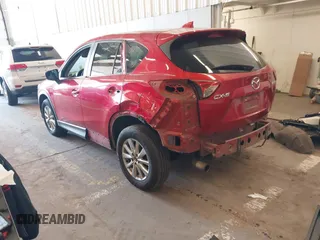 2016 Mazda CX-5 Sport z VIN JM3KE2BY3G0684861, wystawiony jako IAAI lot #42050897 z przebiegiem 165 688 mil mil oraz . Historia ofert i sprzedaży dostępna na DreamBid. Obrazek 3.