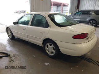 1997 Ford Contour LX with VIN 1FALP6537VK132379, listed as a IAAI auction lot 42771426 with 122,263 mi miles and . Bid and sale history available at DreamBid. Image 3.