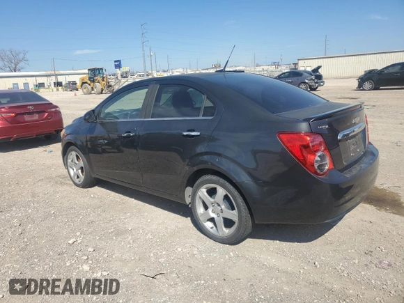 2014 Chevrolet Sonic LTZ with VIN 1G1JE5SB9E4103444, listed as a Copart auction lot 46949955 with 120,986 mi miles and Clean Title. Bid and sale history available at carsss.com. Image 2.