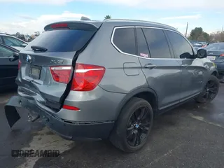 2013 BMW X3 xDrive35i with VIN 5UXWX7C5XDL977879, listed as a IAAI auction lot 41396936 with 107,727 mi miles and . Bid and sale history available at DreamBid. Image 4.