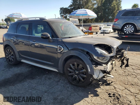 2018 MINI Countryman Cooper S with VIN WMZYT3C39J3E93214, listed as a Copart auction lot 77655444 with 101,401 mi miles and Salvage Title. Bid and sale history available at carsss.com. Image 4.