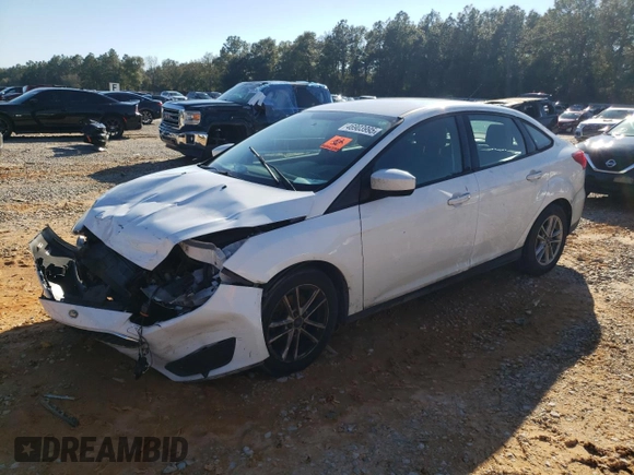 2018 Ford Focus SE with VIN 1FADP3F23JL220312, listed as a Copart auction lot 46903995 with 128,549 mi miles and Salvage Title. Bid and sale history available at carsss.com. Image 1.