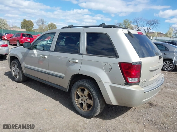 2007 Jeep Grand Cherokee Laredo with VIN 1J8GR48KX7C513145, listed as a IAAI auction lot 41994486 with 188,870 mi miles. Bid and sale history available at carsss.com. Image 3.