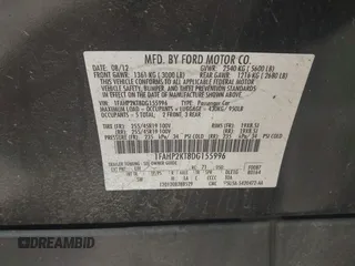 2013 Ford Taurus SHO z VIN 1FAHP2KT8DG155996, wystawiony jako IAAI lot #42709051 z przebiegiem 162 956 mil mil oraz . Historia ofert i sprzedaży dostępna na DreamBid. Obrazek 9.