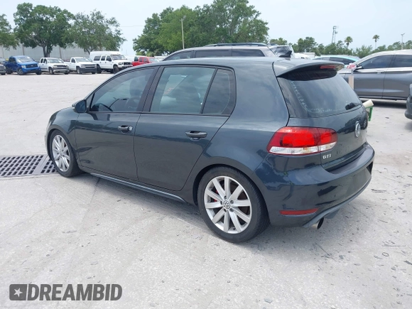 2010 Volkswagen GTI z VIN WVWGV7AJ1AW264214, wystawiony jako IAAI lot #42341801 z przebiegiem 165 464 mil mil oraz . Historia ofert i sprzedaży dostępna na DreamBid. Obrazek 3.