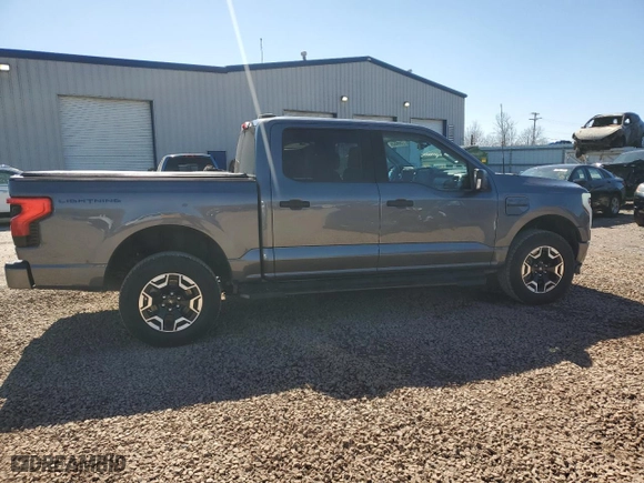 2023 Ford F-150 Lightning Pro with VIN 1FTVW1EL8PWG10894, listed as a Copart auction lot 50988655 with NaN miles and Salvage Title. Bid and sale history available at carsss.com. Image 12.