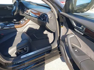 2017 Audi A8 with VIN WAU44AFD0HN017821, listed as a IAAI auction lot 41676097 with 107,378 mi miles and . Bid and sale history available at DreamBid. Image 5.