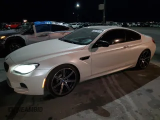 2017 BMW M6 z VIN WBS6J9C56HD934812, wystawiony jako Copart lot #44018915 z przebiegiem 84 409 mil mil oraz Szkoda całkowita • Salvage title. Historia ofert i sprzedaży dostępna na DreamBid. Obrazek 1.