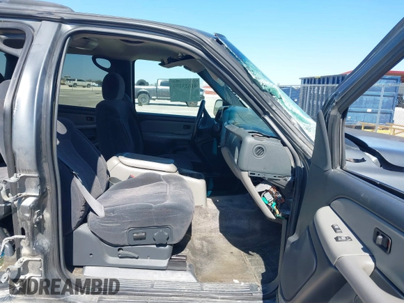 2002 Chevrolet Tahoe LT z VIN 1GNEC13Z42R319646, wystawiony jako IAAI lot #41623259 z przebiegiem 250 430 mil mil oraz . Historia ofert i sprzedaży dostępna na DreamBid. Obrazek 5.