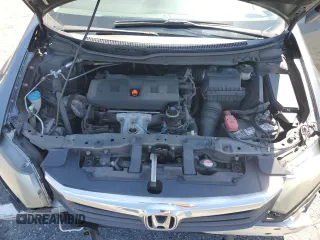 2012 Honda Civic LX z VIN 19XFB2F55CE360542, wystawiony jako Copart lot #59077995 z przebiegiem 139 751 mil mil oraz Szkoda całkowita • Salvage title. Historia ofert i sprzedaży dostępna na DreamBid. Obrazek 11.