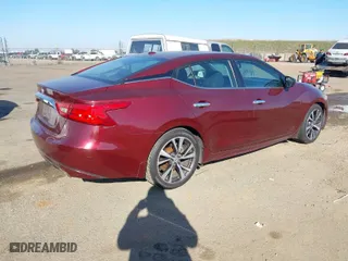 2016 Nissan Maxima 3.5 Platinum with VIN 1N4AA6AP3GC902379, listed as a IAAI auction lot 41454987 with 245,563 mi miles. Bid and sale history available at carsss.com. Image 4.