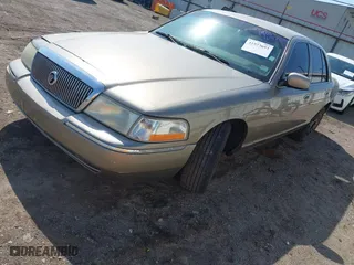 2004 Mercury Grand Marquis GS with VIN 2MEFM74W94X674014, listed as a IAAI auction lot 41973693 with 163,865 mi miles. Bid and sale history available at carsss.com. Image 16.