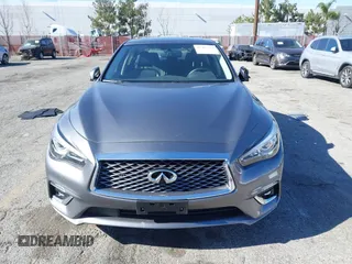 2021 Infiniti Q50 Luxe z VIN JN1EV7BP3MM701871, wystawiony jako IAAI lot #41383333 z przebiegiem 28 634 mil mil oraz . Historia ofert i sprzedaży dostępna na DreamBid. Obrazek 13.